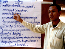 Va Nou trains community volunteers on defendants' rights in the Khmer Rouge Tribunal